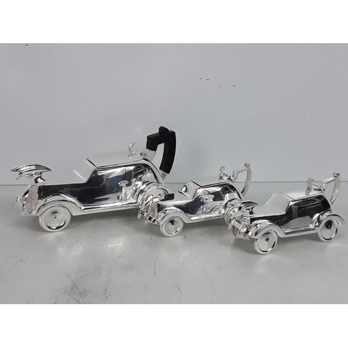 149 - Heavy cast metal three piece car related tea set