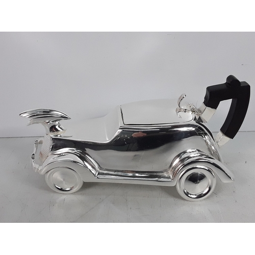 149 - Heavy cast metal three piece car related tea set