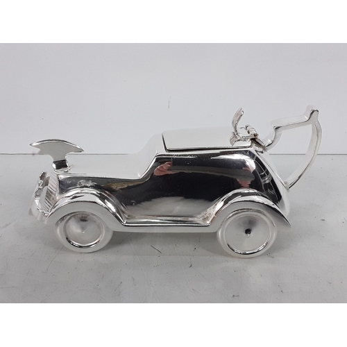 149 - Heavy cast metal three piece car related tea set