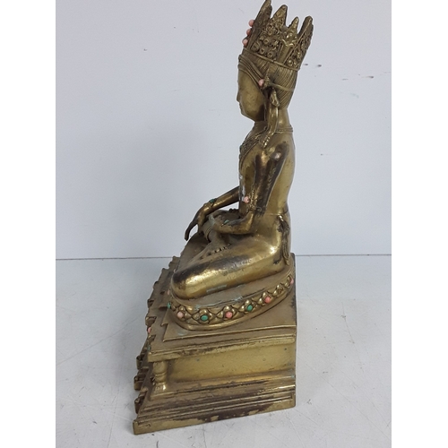 166 - Cast bronze stone set oriental goddess figure