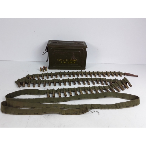 125 - Belt of M119 inert ammunition in period tin