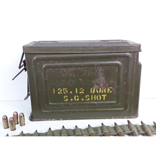 125 - Belt of M119 inert ammunition in period tin