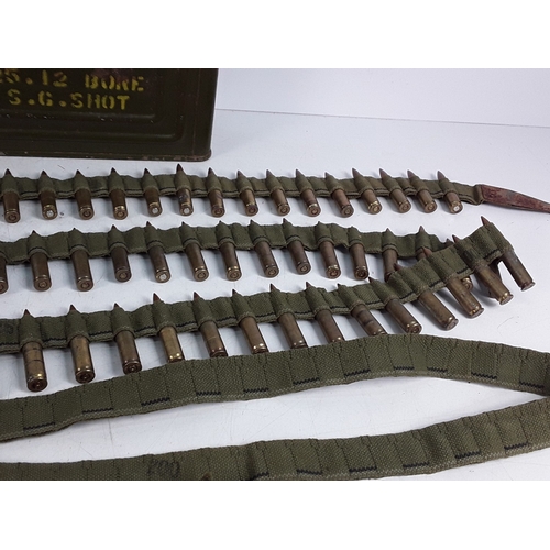 125 - Belt of M119 inert ammunition in period tin