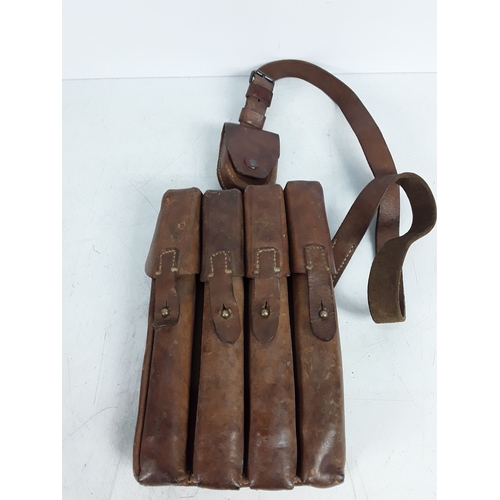 131 - Leather M56 magazine pouch with four magazines