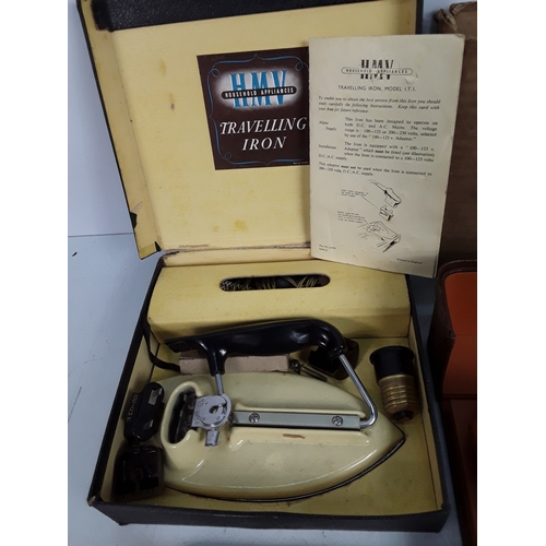 173 - Travelling iron, vanity set and razor stroop