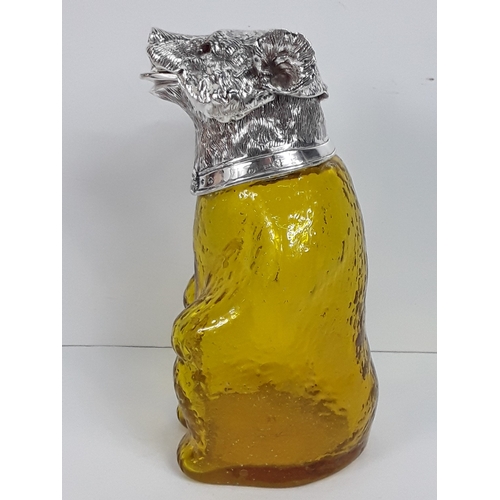 67 - Plated and glass claret jug in the form of a bear