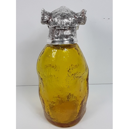 67 - Plated and glass claret jug in the form of a bear