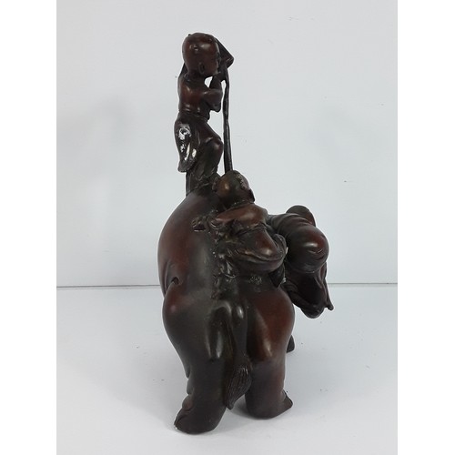 110 - Oriental cast bronze elephant figure, 23cms in height
