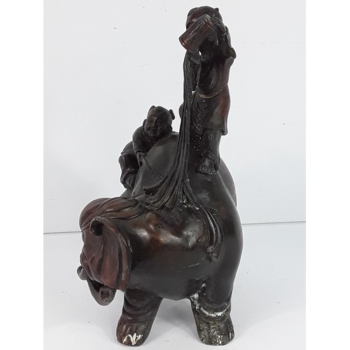 110 - Oriental cast bronze elephant figure, 23cms in height