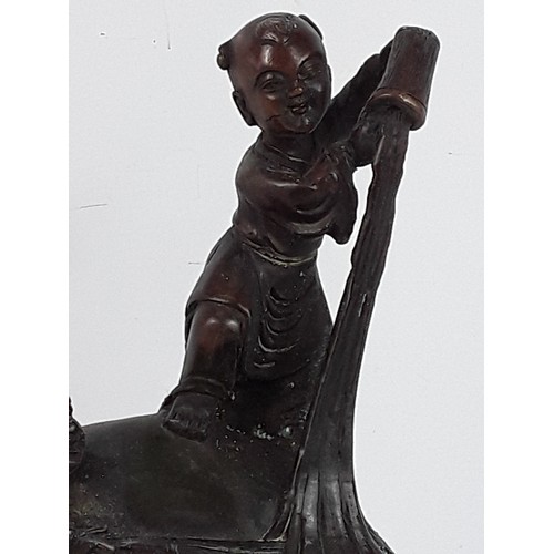 110 - Oriental cast bronze elephant figure, 23cms in height
