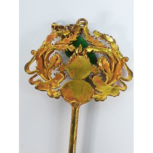 215 - Two Oriental hat pins