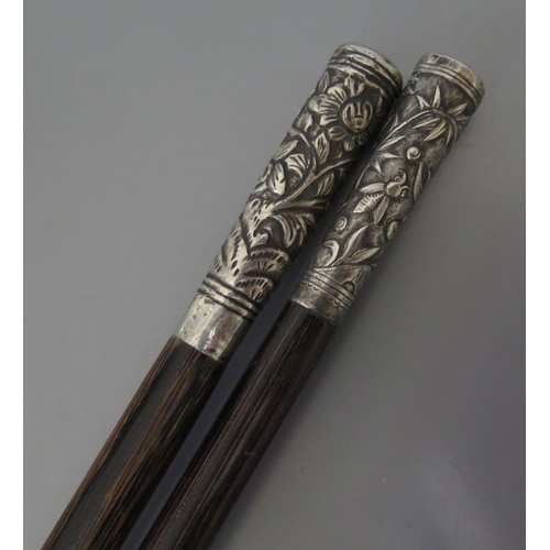 101 - An Oriental Silver Top Cane and one other