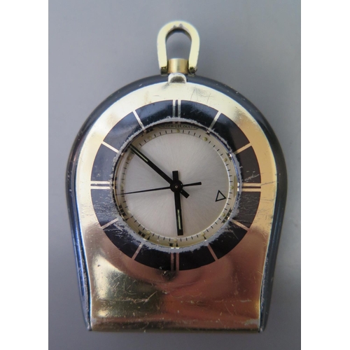 160 - A Jaeger LeCoultre Memovox Travel Alarm Clock with manual wind movement, case back no. 1190604, runn... 