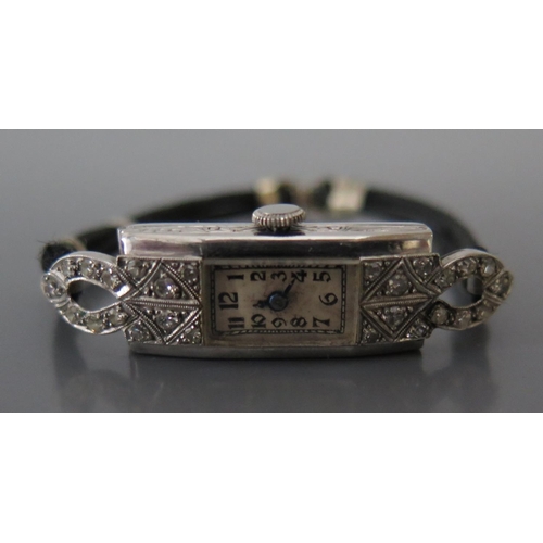 163 - A Ladies Platinum and Diamond Set Evening Watch with manual wind movement, running c. 1920's