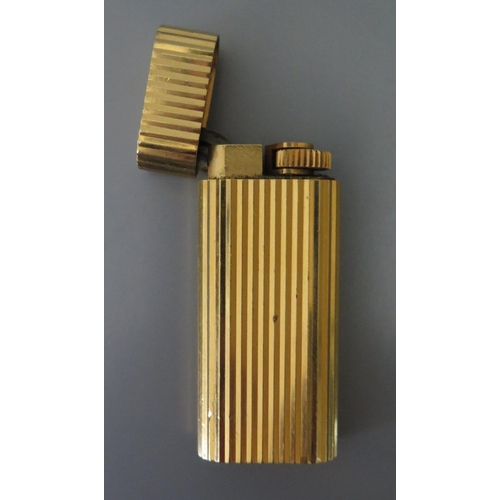 266 - A Cartier Gold Plated Lighter, 1989, A45483