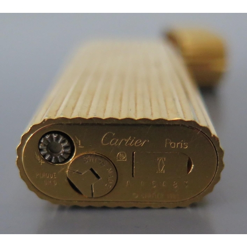 266 - A Cartier Gold Plated Lighter, 1989, A45483