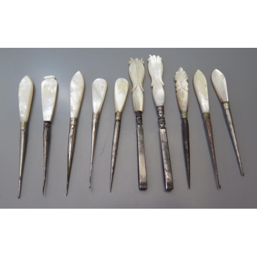 276 - A Collection of Nineteenth Century Mother of Pearl Handled Tweezers etc