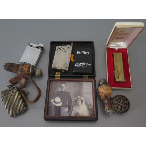 278 - A Nineteenth Century Photograph Frame, lighters etc