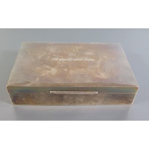 33 - An Elizabeth II Silver Cigarette Box, Sheffield 1953, Walker & Hall, 14.5 x 9 cm