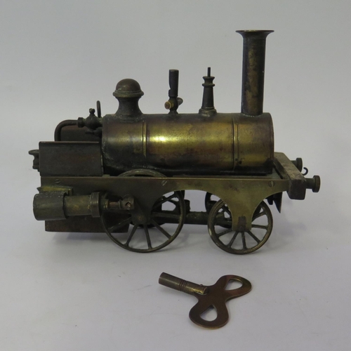 330 - An Early Live Steam Model Locomotive, 2 1/4 in. track.
Not With Key as illustrated.