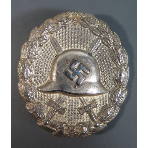 361 - From the Charles Hume-Smith Collection: A 1936 Spanish Civil War Wound Badge