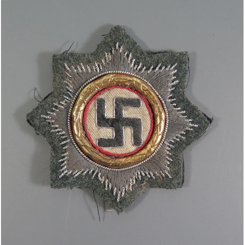 374 - From the Charles Hume-Smith Collection: A WWII Nazi German Army Order of The German Cross Cloth Badg... 