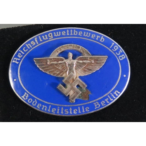 385 - From the Charles Hume-Smith Collection: A WWII Nazi German NSFK Participant Enamel Badge, maker Rob.... 