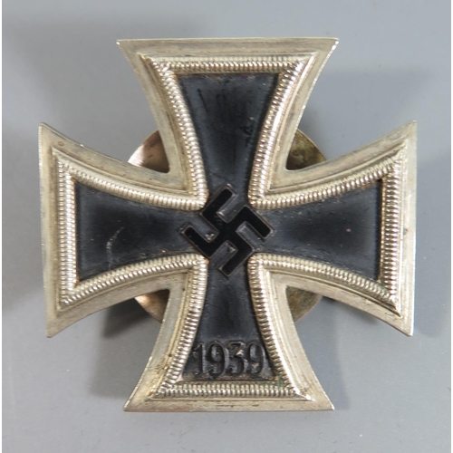 392 - From the Charles Hume-Smith Collection: A WWII Nazi German Iron Cross First Class with screw roundel... 