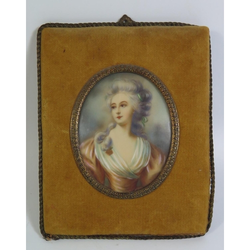 406 - A Continental Miniature half length portrait of a lady in a plush frame