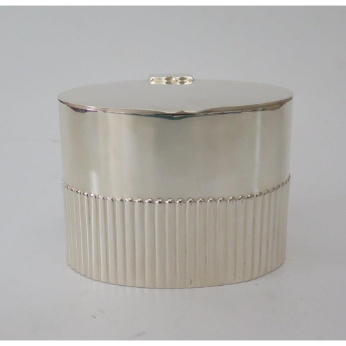 43 - A Victorian Silver Tea Caddy of oval form with fluting, London 1892, William Hutton & Sons, 233g