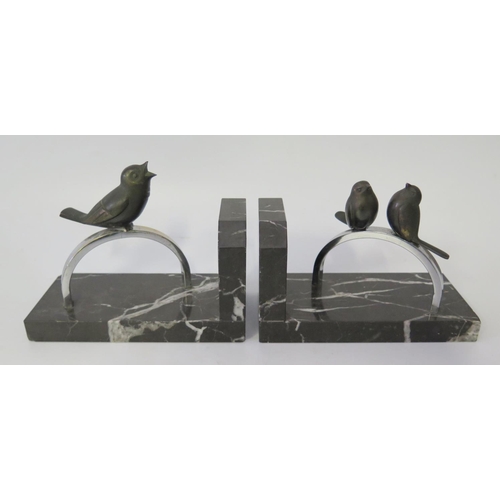 430 - A Pair of Art Deco Bookends modelled as bronze birds on chrome with marble base