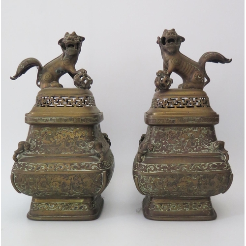 464 - A Pair of 18th/19th Century Chinese Bronze Vases with covers, 26.5cm