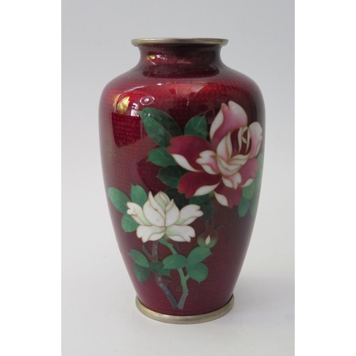 472 - A Modern Japanese Cloisonne Vase decorated with flowers on a crimson ground, 12.5cm