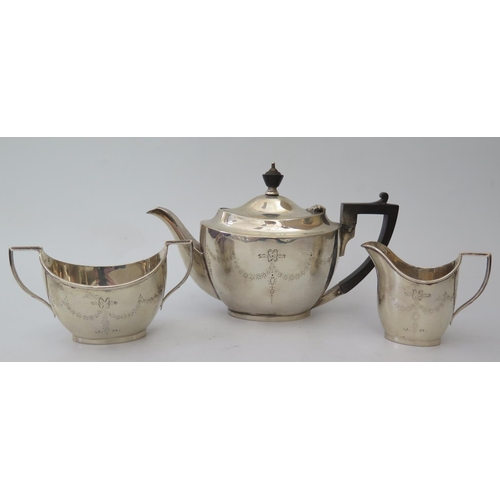 8 - A George V Silver Bachelor's Tea Set with chased and pricked ribbon and swag decoration, Sheffield 1... 