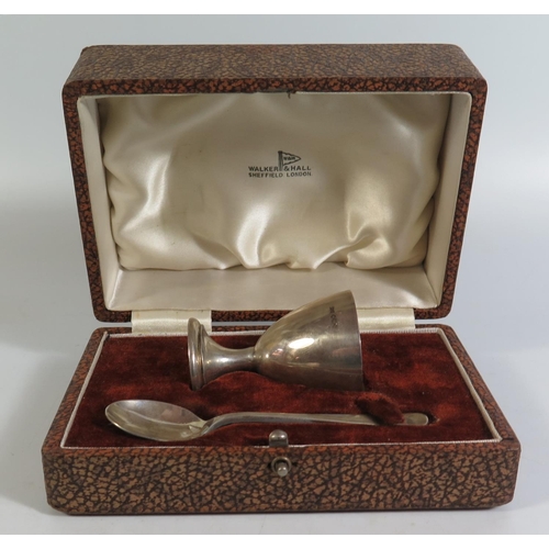 81 - An Elizabeth II Sheffield Silver Cased Eggcup and Spoon, Walker & Hall