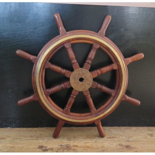 352 - A Heavy Ship's Wheel with brass inlay, c. 96 cm diameter