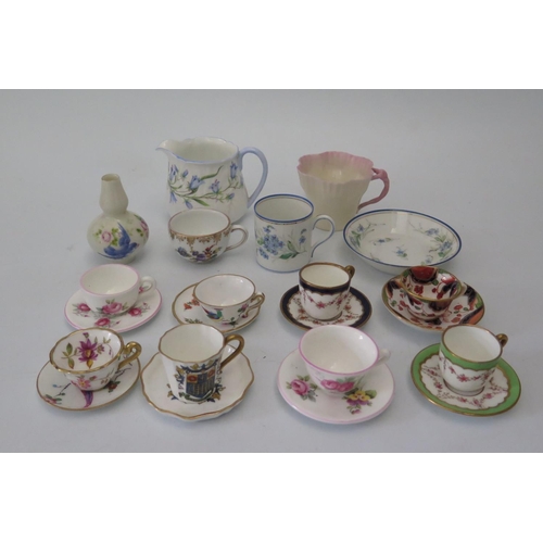 448 - A Collection of Miniature Cups and Saucers including Belleek, Augustus Rex, Coalport, miniature Shel... 