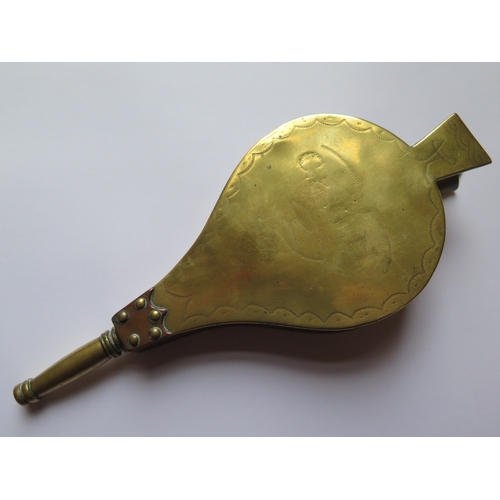 134a - A Novelty Copper and Brass Flask in the form of a pair of bellows, engraved with initials within a p... 