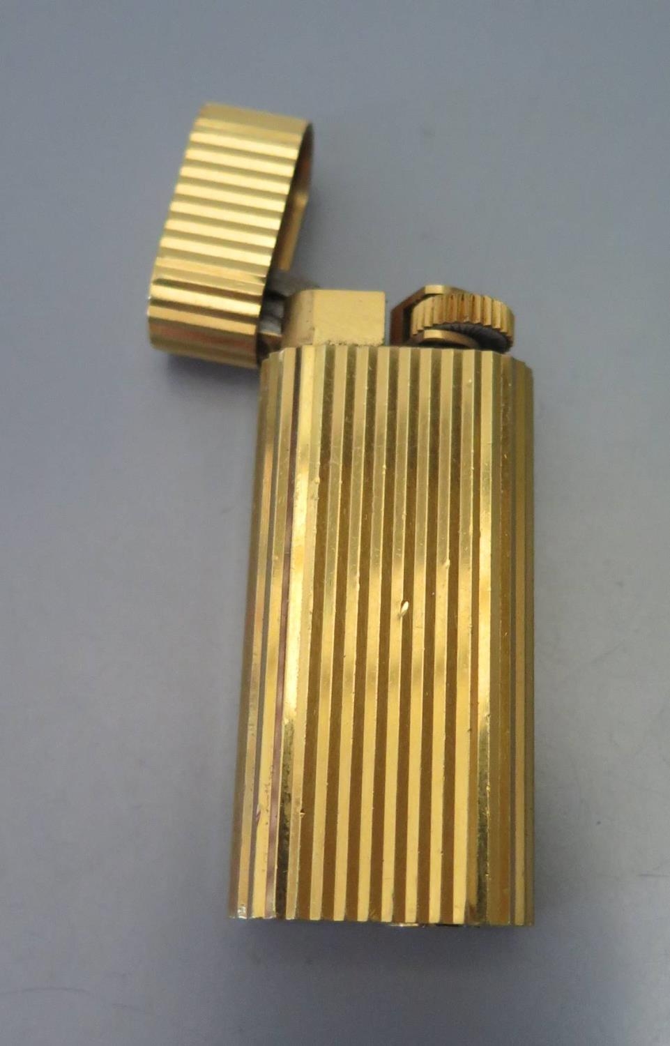A Cartier Plated Lighter, 1989, A45483