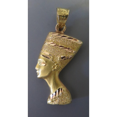 37c - An Egyptian Yellow Metal Pendant in the form of a Pharaohs head, 2.6g