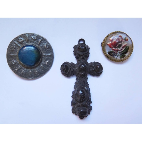 40 - A Pewter Brooch set with Ruskin style roundel, Victorian carved cross and one other brooch