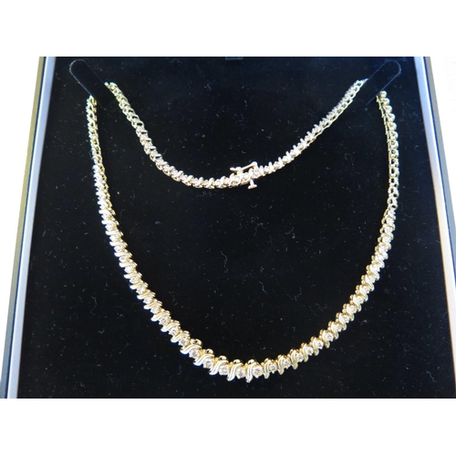 43b - A 14K Yellow Gold and Diamond Necklace, (approx. 5ct diamonds, 26.9g