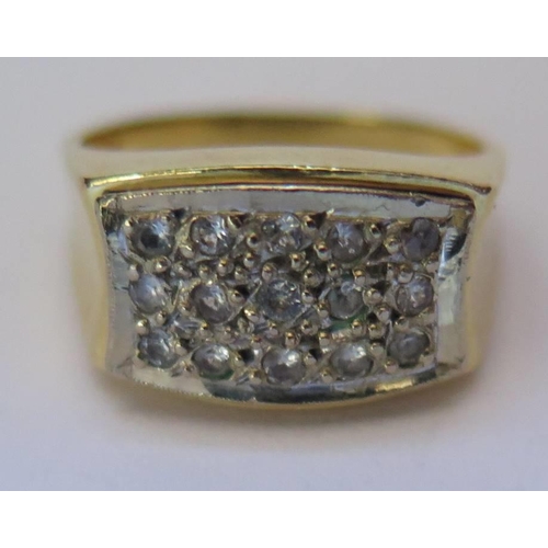 44 - An 18ct Gold and Diamond Dress Ring, stamped E.65, size N.5, 7.6g