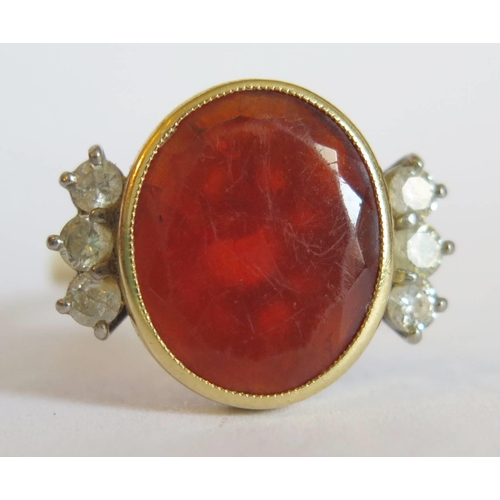 44b - An 18ct Yellow Gold, Carnelian and Diamond Dress ring, size P.5, 6.8g