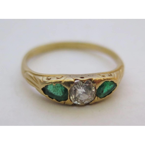 44i - A Gold, Emerald and Diamond Three Stone Ring, marks rubbed, size N, 2.3g