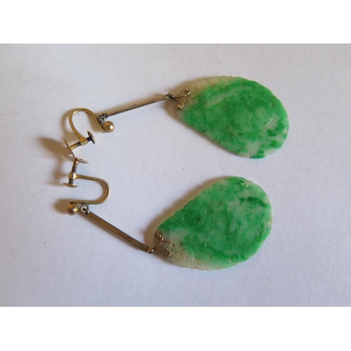 45c - A Pair of Chinese 9ct Yellow Gold and Carved Jadeite Pendant Earrings with screw fittings, 55mm drop