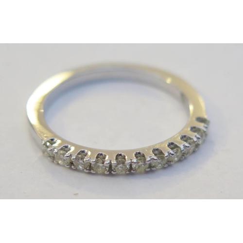 46h - A 9ct White Gold and Diamond half Eternity Ring, size L, 2.1g