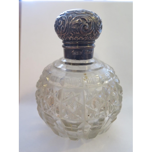 6b - An Edward VII Silver Topped Cut Glass Scent Bottle, Birmingham 1903, George Ernest Hawkins, 12.5cm