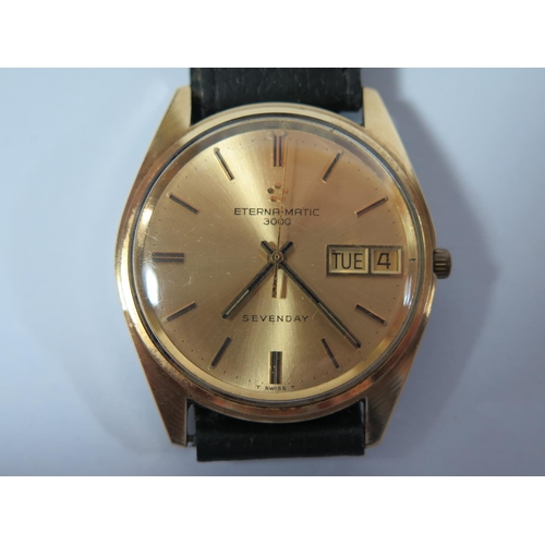 100 - An Eterna-Matic 3000 Sevenday Gent's Gold Plated Day Date Wristwatch with 35mm dial, running