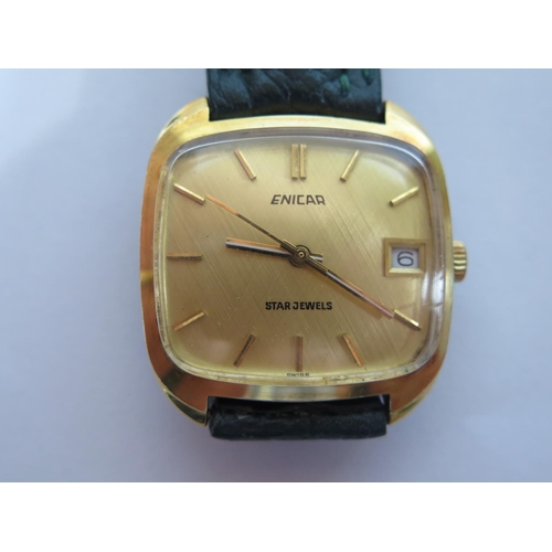 102 - An Enicar Star Jewels Gent's Gold Plated and Stainless Steel Manual Wristwatch with 33mm date dial, ... 